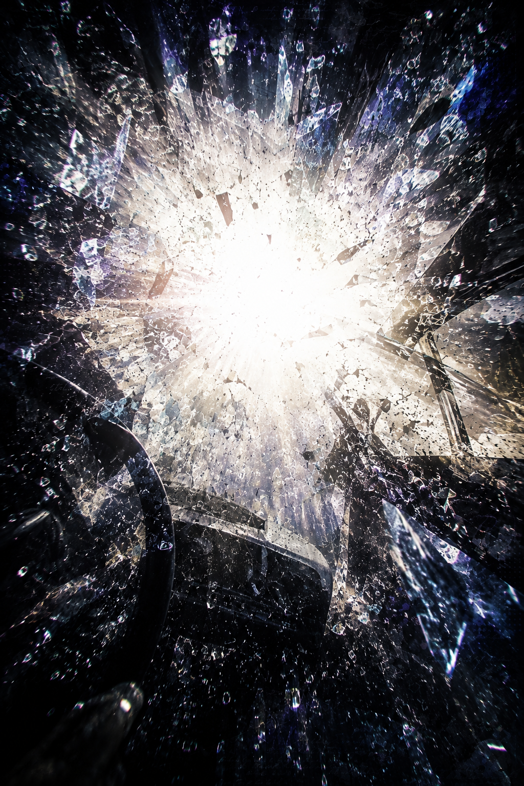 A fragmented memory of blinding light and shattered glass during a violent car crash